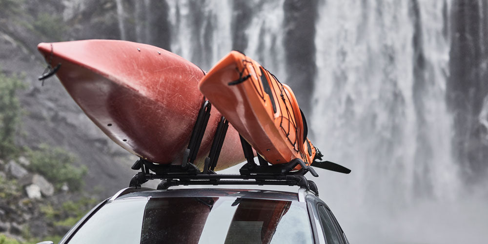 Transporting canoe on roof rack sale