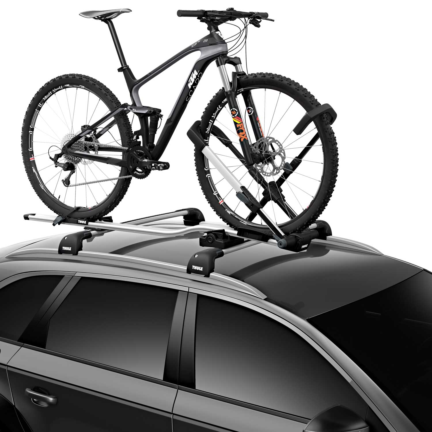 Full suspention mountain bike loaded on the Thule UpRide 599 and Thule wingbar edge roofbars